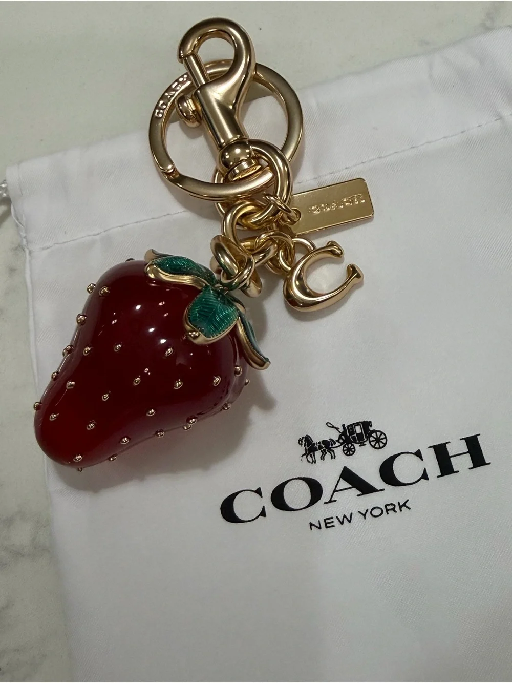 COACH Gold-Tone Strawberry Charm Key Ring with Red Enamel